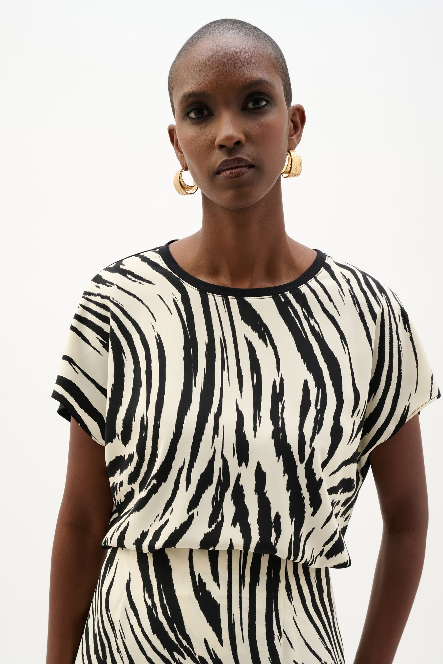 Recycled Woven Silky Knit Top | Beige/Black Animal